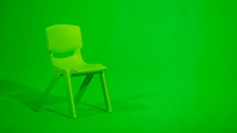 Kalimantan Green - green plastic chair on green floor